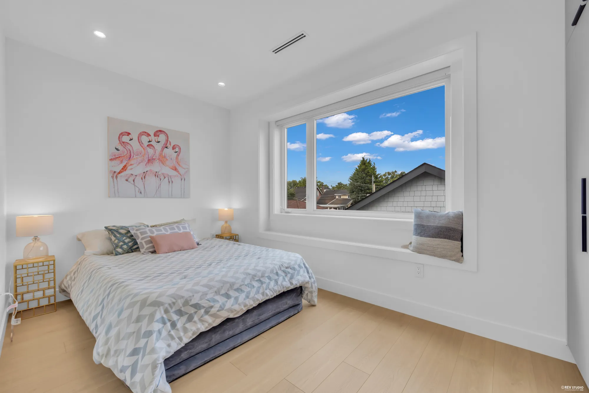 The same bedroom from the doorway, showing the window